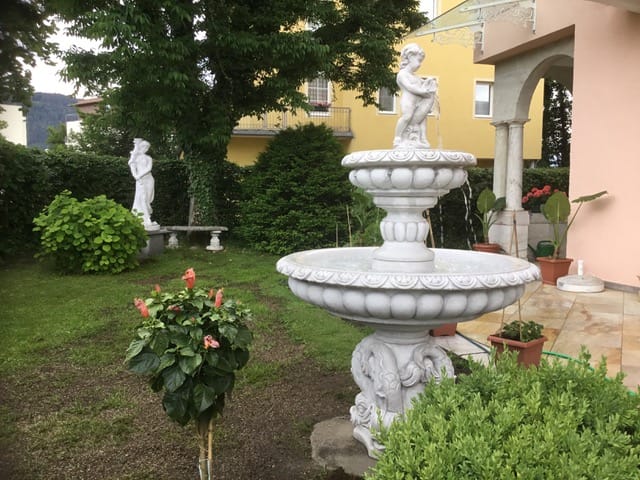 Barockbrunnen mit Putte - Kundenfoto